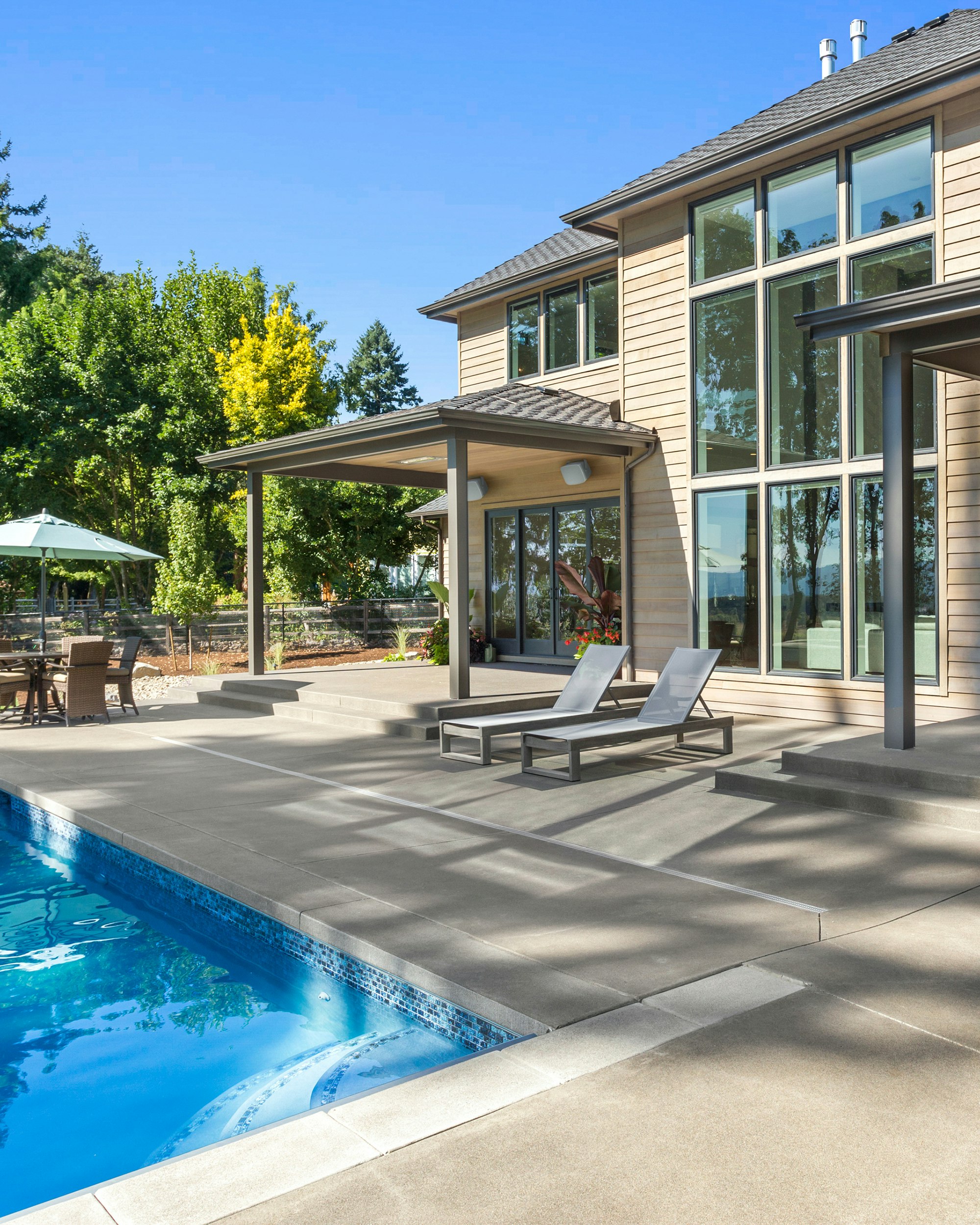 Klipsch RSM 800 in Big Outdoor Living Area with Pool and Dining 2000x2500